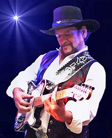 What was Waylon Jennings first band?