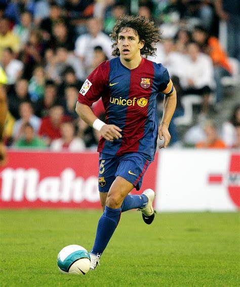 It is Carles Puyol or Daniel Alves