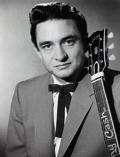 This is the male music singer Johnny Cash or Waylon Jennings？